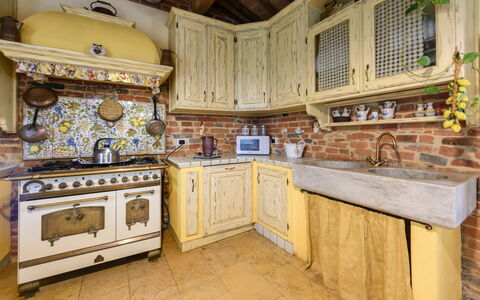 Villa Lorenzana: Cabinetry, Property, Countertop, Building, Wood, Kitchen, Interior Design, Architecture, Flooring, Floor