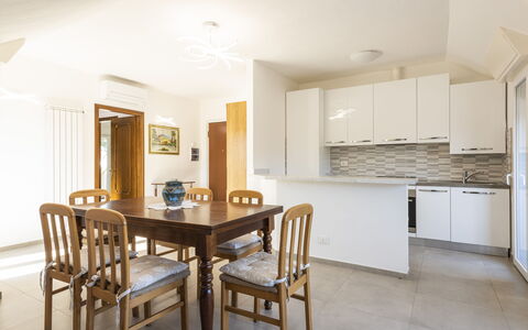 Casa Serchio: Table, Furniture, Property, Cabinetry, Wood, Countertop, Interior Design, Flooring, Chair, Floor