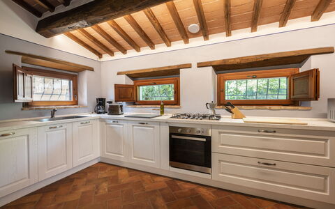 Villa Chio: Countertop, Cabinetry, Furniture, Property, Tap, Window, Building, Kitchen, Houseplant, Kitchen Appliance