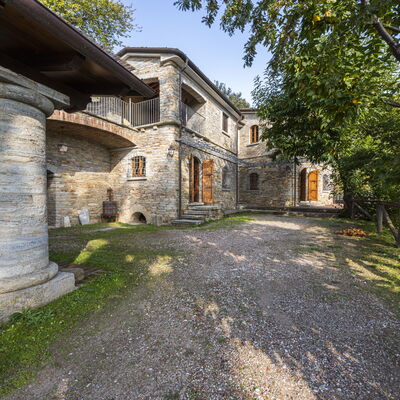 Villa Montignoso: Plant, Property, Building, Sky, Window, Tree, House, Road Surface, Cottage, Grass