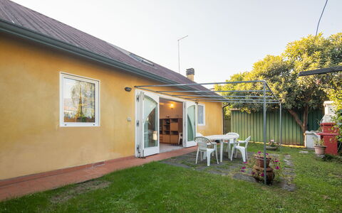 Villa Isola: Plant, Sky, Building, Window, Chair, Tree, Cottage, Land Lot, Grass, Street Light