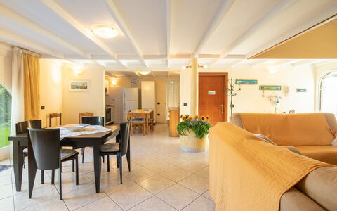 Villa Isola: Furniture, Chair, Building, Plant, Table, Architecture, Houseplant, Flooring, Floor, Wood