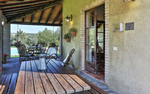 Villa Le Selvole: Property, Chair, Plant, Azure, Wood, Porch, Interior Design, Flowerpot, Building, Cottage