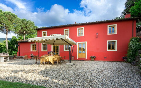 Villa Guamo: Cloud, Plant, Sky, Building, Property, Window, Tree, House, Land Lot, Wood