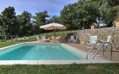 Villa Di Gaiole: Water, Sky, Plant, Swimming Pool, Shade, Tree, Chair, Outdoor Furniture, Umbrella, Grass