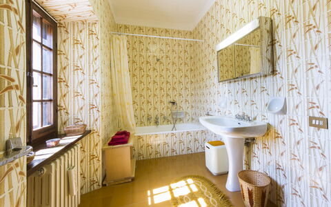 Villa Di Gaiole: Mirror, Furniture, Tap, Property, Sink, Plumbing Fixture, Building, Wood, Countertop, Bathroom