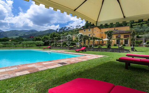 Villa Castellaccio: Water, Plant, Cloud, Property, Building, Sky, Green, Swimming Pool, Outdoor Furniture, Shade