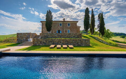 Casa Insieme: Cloud, Water, Sky, Plant, Property, Blue, Building, Green, Azure, Natural Landscape