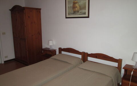Giannella Holiday Apartment: Furniture, Property, Comfort, Bed, Wood, Picture Frame, Building, Interior Design, Flooring, Bed Frame
