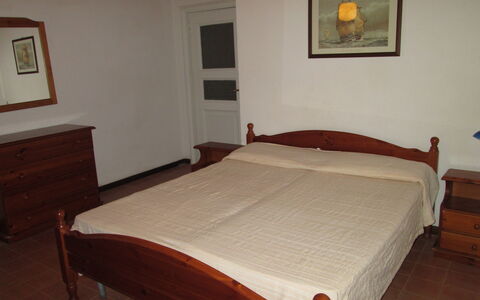 Giannella Holiday Apartment: Building, Furniture, Picture Frame, Property, Comfort, Wood, Textile, Table, Interior Design, Floor