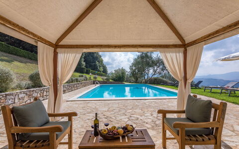 Chianti Resort: Plant, Furniture, Property, Water, Swimming Pool, Azure, Chair, Shade, Building, Interior Design