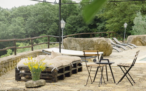 Villa San Leo: Plant, Table, Flower, Building, Outdoor Furniture, Tree, Shade, Interior Design, Chair, Outdoor Table