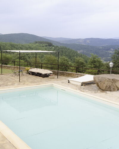 Villa San Leo: Water, Sky, Cloud, Swimming Pool, Building, Mountain, Tree, Composite Material, Plant, Real Estate