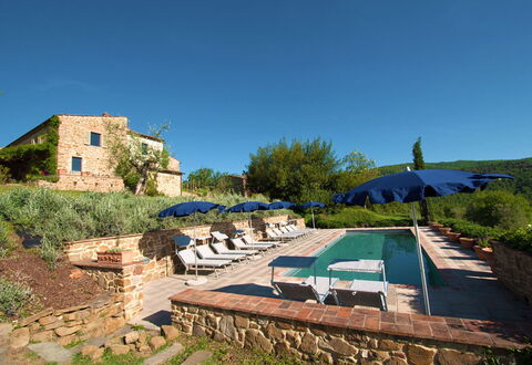 Villa Badia: Plant, Sky, Plant Community, Azure, Land Lot, Tree, Shade, Table, Outdoor Furniture, Grass