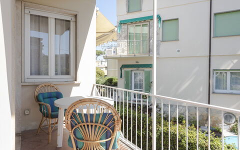 Casa Lelia: Building, Window, Property, Plant, Table, Furniture, Chair, Wood, Porch