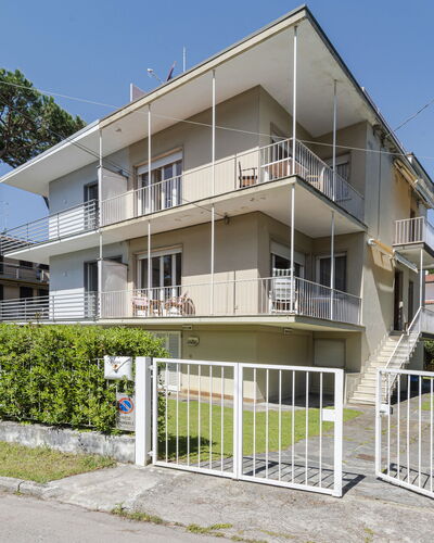Casa Lelia: Plant, Sky, Building, Window, House, Urban Design, Land Lot, Tree, Fence, Condominium