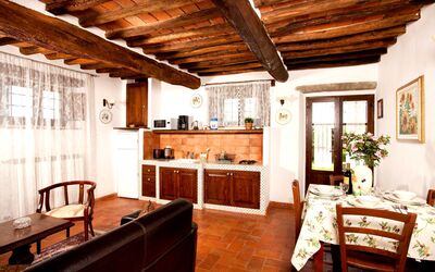 Camelia: Furniture, Table, Houseplant, Window, Wood, Plant, Chair, Cabinetry, Architecture, Living Room