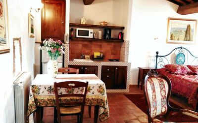 Viola: Furniture, Property, Cabinetry, Picture Frame, Table, Building, Wood, Comfort, Interior Design, Living Room