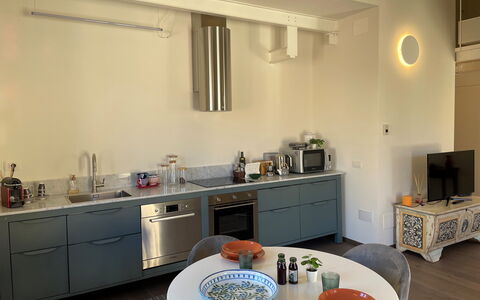 Sui Tetti Di Lucca: Cabinetry, Kitchen Sink, Tap, Countertop, Sink, Furniture, Kitchen, Plumbing Fixture, Table, Interior Design