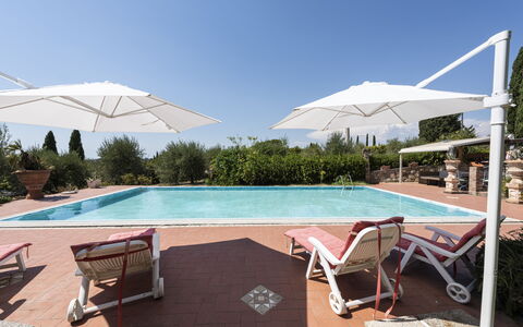 Villa Cevoli: Water, Sky, Building, Plant, Property, Swimming Pool, Azure, Shade, Outdoor Furniture, House