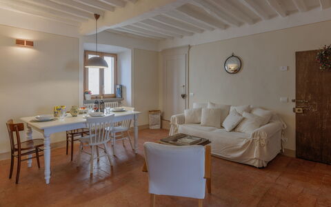 Appartamento Mancini: Table, Property, Furniture, Wood, Building, Couch, Architecture, Door, Floor, Window