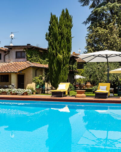 Podere La Torre: Water, Plant, Property, Sky, Furniture, Building, Swimming Pool, Tree, Chair, Azure