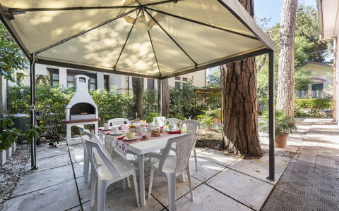 Villa Marconi: Table, Plant, Furniture, Chair, Building, Shade, Outdoor Table, Outdoor Furniture, Tree, Leisure