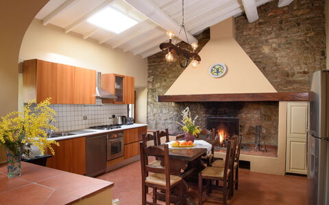 Casa San Piero: Countertop, Cabinetry, Property, Furniture, Table, Chair, Plant, Wood, Kitchen, Interior Design