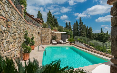 Villa Vico: Water, Cloud, Sky, Plant, Swimming Pool, Azure, Tree, Natural Landscape, Grass, Building