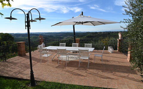 Villa Tresanti: Sky, Property, Table, Furniture, Cloud, Umbrella, Shade, Outdoor Table, Tree, Outdoor Furniture