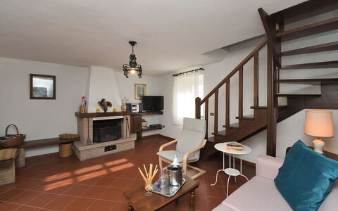 Villa Antelminelli: Picture Frame, Property, Furniture, Wood, Lighting, Table, Couch, Floor, Flooring, Living Room