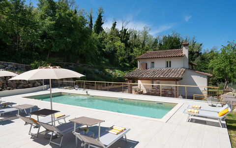 Villa Noemi: Sky, Property, Furniture, Plant, Swimming Pool, Table, Shade, Tree, Umbrella, Chair