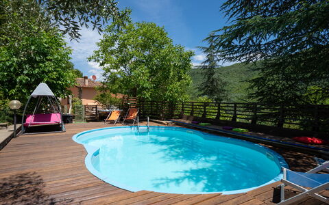 Villa La Vigna: Water, Property, Plant, Sky, Swimming Pool, Building, Nature, Tree, Shade, Body Of Water