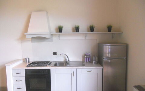 Orangerie Degli Ulivi: Cabinetry, Kitchen Sink, Kitchen Appliance, Countertop, Sink, Kitchen Stove, Building, Kitchen, Home Appliance, Lighting