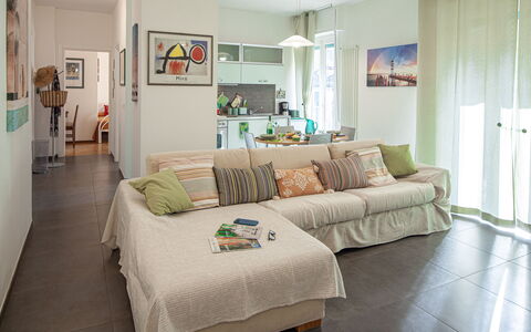 Apartment Serena - Levanto: Couch, Furniture, Picture Frame, Table, Comfort, Lighting, Wood, Building, Interior Design, Living Room