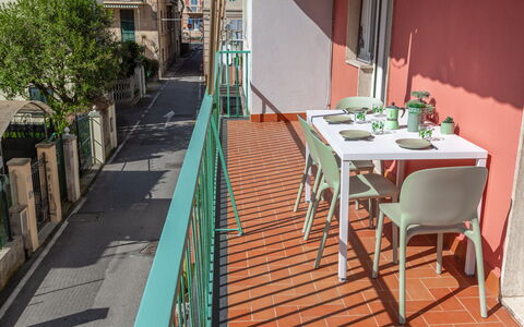 Apartment Serena - Levanto: Furniture, Table, Wood, Chair, Building, Window, Tree, Urban Design, Flowerpot, Flooring