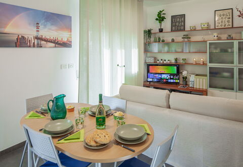 Apartment Serena - Levanto: Table, Furniture, Property, Couch, Azure, Interior Design, Shelf, Architecture, Picture Frame, Tableware