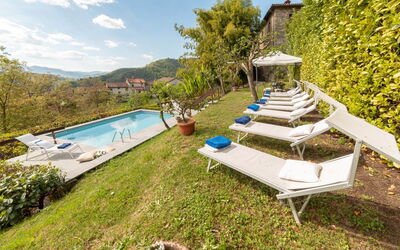 Villa In Garfagnana: Plant, Sky, Water, Cloud, Swimming Pool, Outdoor Furniture, Natural Landscape, Tree, Architecture, Leisure