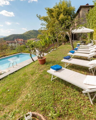 Villa In Garfagnana: Plant, Sky, Water, Cloud, Swimming Pool, Outdoor Furniture, Natural Landscape, Tree, Architecture, Leisure