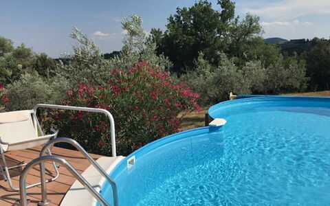 Villa Nibbiano: Water, Sky, Plant, Property, Swimming Pool, Azure, Cloud, Leisure, Outdoor Furniture, Natural Landscape