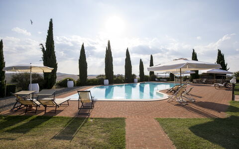 Villa Sulle Crete: Sky, Water, Cloud, Plant, Tree, Swimming Pool, Building, Outdoor Furniture, Grass, Leisure
