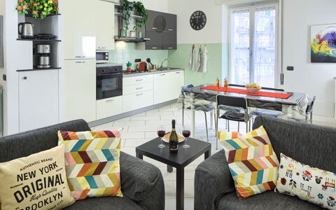 Apartment Fernanda 2 - Levanto: Couch, Furniture, Property, Table, Green, Interior Design, Picture Frame, Lighting, Comfort, Living Room