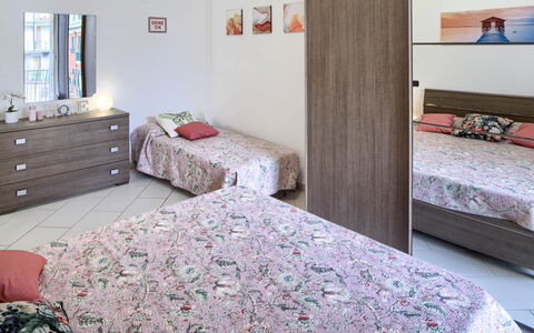 Apartment Fernanda 2 - Levanto: Furniture, Property, Comfort, Cabinetry, Textile, Wood, Interior Design, Floor, Flooring, Bed Frame