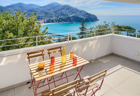 Casa Grande Mare - Levanto: Water, Sky, Building, Property, Cloud, Wood, Chair, Outdoor Furniture, Shade, House