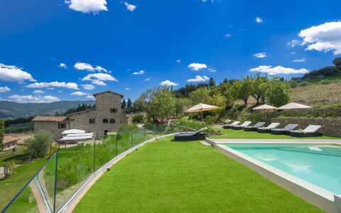 La Torre Di Panzano: Cloud, Sky, Plant, Water, Building, Natural Landscape, Swimming Pool, Grass, Tree, Arecales