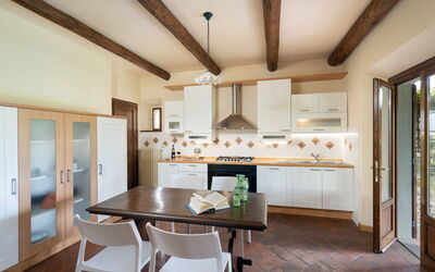 Castelluccio Dependance - Arezzo, Toscana: Property, Furniture, Table, Wood, Countertop, Interior Design, Lighting, Kitchen, Flooring, Floor
