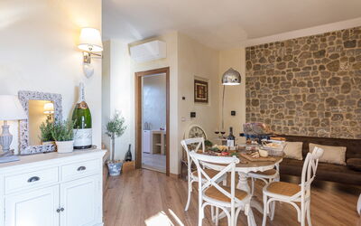 Suite Paradiso: Furniture, Table, Cabinetry, Chair, Plant, Wood, Houseplant, Interior Design, Couch, Living Room