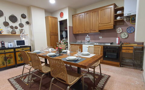 Residenza Otello: Furniture, Cabinetry, Table, Countertop, Chair, Wood, Kitchen, Interior Design, Home Appliance, Flooring