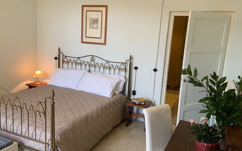 Massarosa Front Lake, The Gargoyles: Furniture, Bed, Bedroom, Wall, Bedding, Interior Design, Bed Sheet, Wood, Floor, Flooring