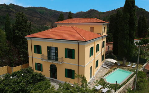 Massarosa Front Lake, The Gargoyles: Sky, Building, Window, Plant, Tree, Cloud, House, Residential Area, Mountain, Real Estate
